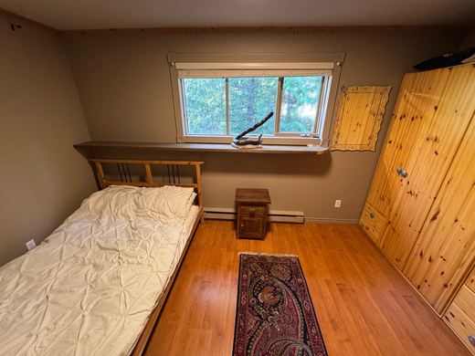 Second bedroom with a double bed and wardrobe
