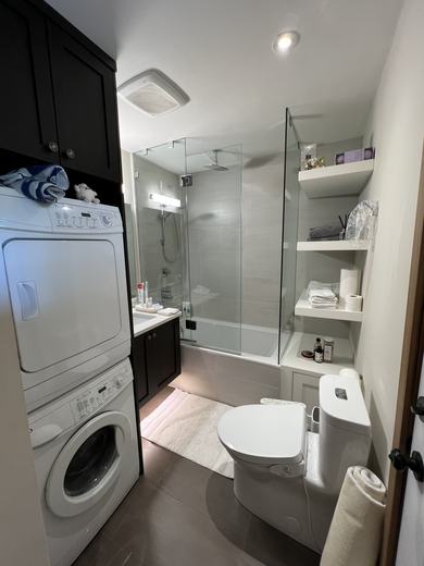 Three piece bathroom on the main floor with in-suite washer and dryer